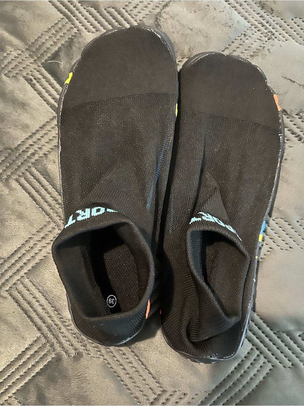 Slip on water shoes: men’s 6.5 to 7, women’s 8.5 to 9